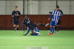 20240126 Halmstads BKs Naeem Mohammed och IFK Göteborgs Adam Carlén under träningsmatchen IFK Göteborg och Halmstads BK på Valhalla IP den 26 januari 2024 i Göteborg.