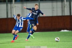 20240126 Halmstads BKs Villiam Granath och IFK Göteborgs Emil Salomonsson under träningsmatchen IFK Göteborg och Halmstads BK på Valhalla IP den 26 januari 2024 i Göteborg.